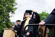 PhD student receives their hood